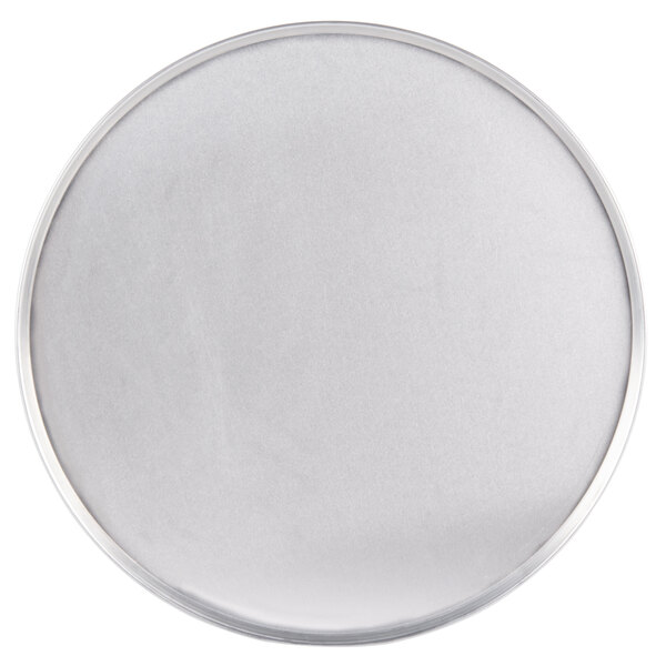 An American Metalcraft aluminum pizza pan with a white circle and silver rim.