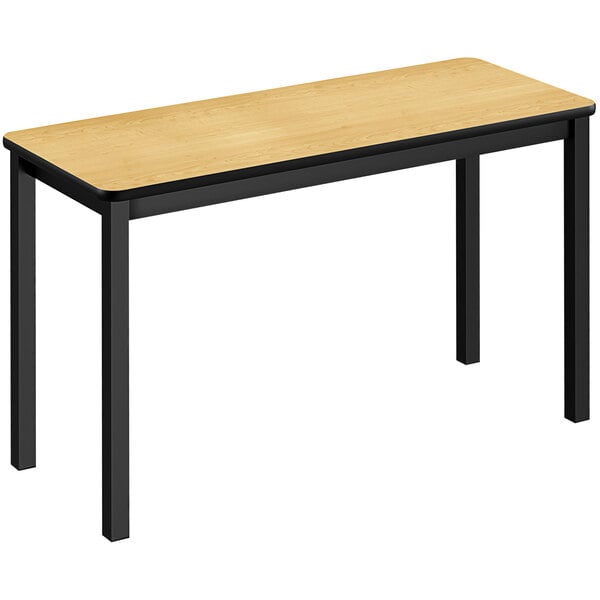 A Correll Fusion Maple lab table with black legs.