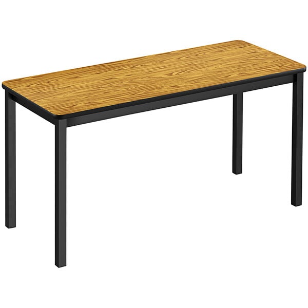 A Correll medium oak rectangular lab table with black legs.