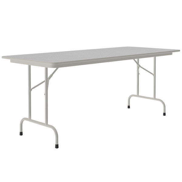 A rectangular white Correll folding table with a gray frame.