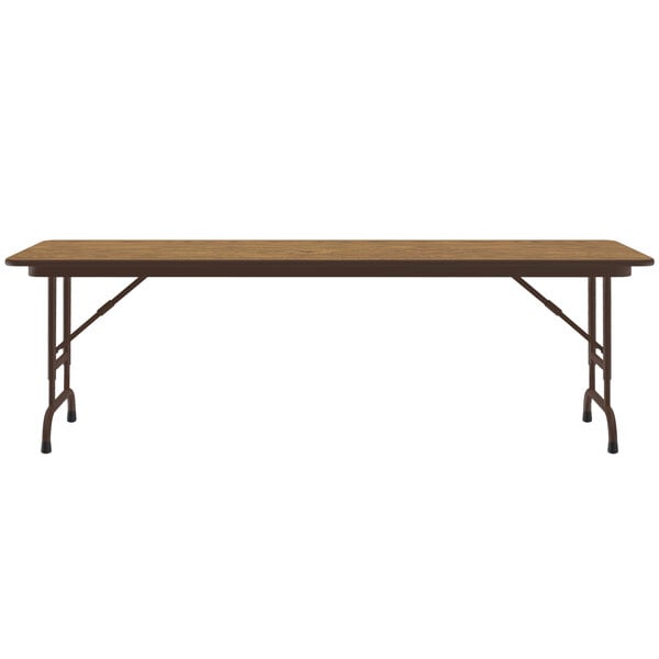 A Correll rectangular folding table with a wooden top and metal legs.