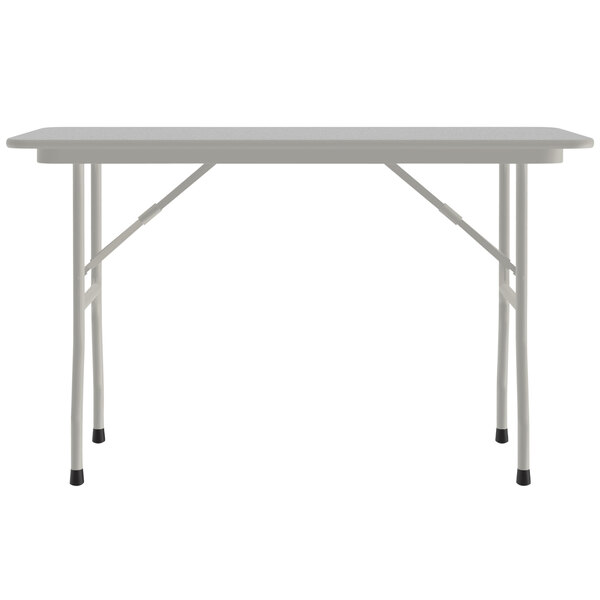 A white rectangular Correll folding table with a gray frame.