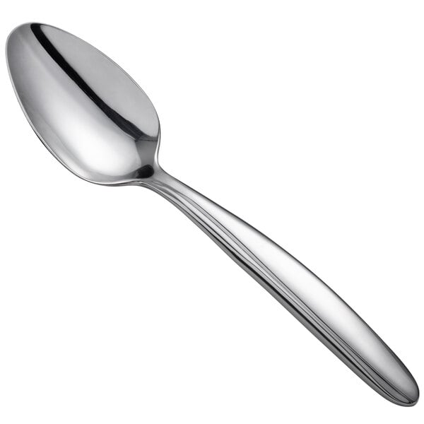 A silver spoon with a Oneida Glissade pattern on the handle.