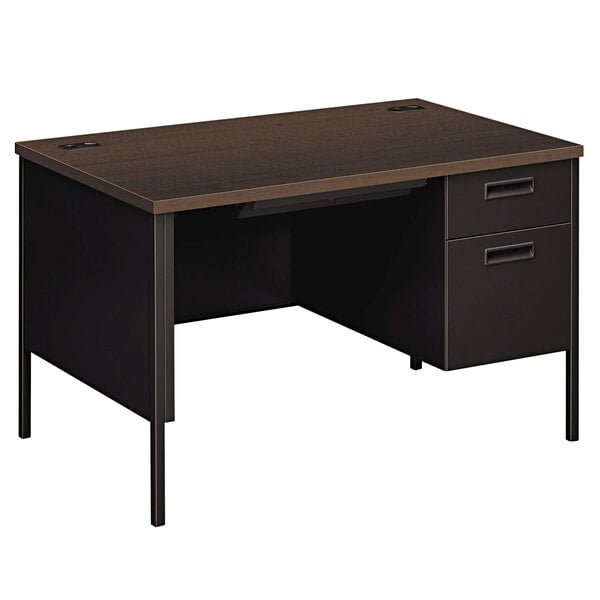 A HON Metro Classic mocha and black desk with right side pedestal and two drawers.