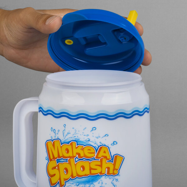 A hand holding a blue lid on a plastic cup.