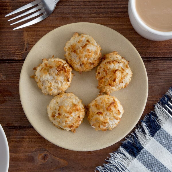 a close up of a coconut macaroon