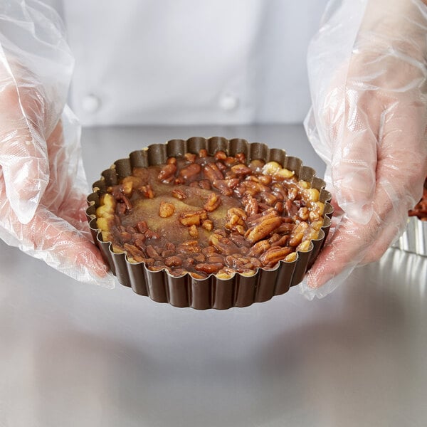 a person holding a bowl of food