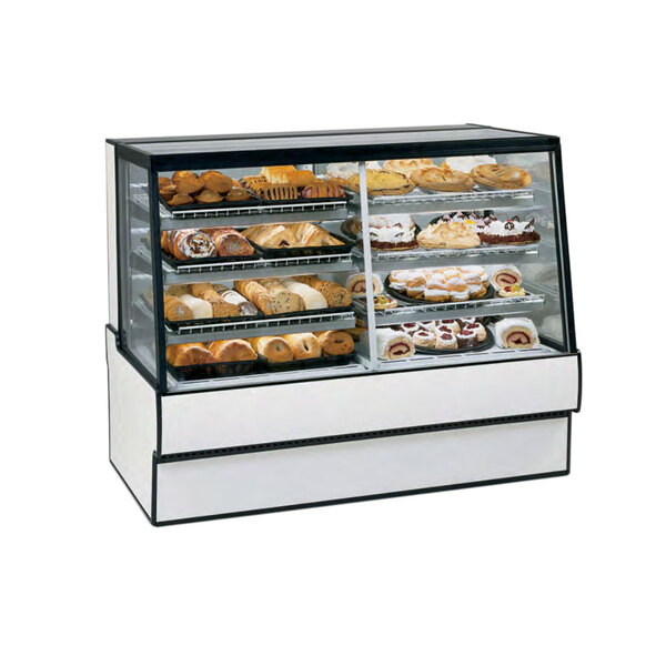 A Federal Industries SGR5042DZ dual-zone bakery display case with pastries on a counter.