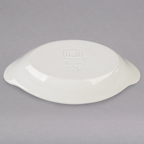 a white plastic bowl with a logo on it