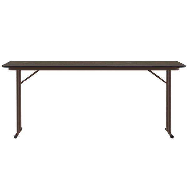 A brown rectangular Correll seminar table with off-set legs.