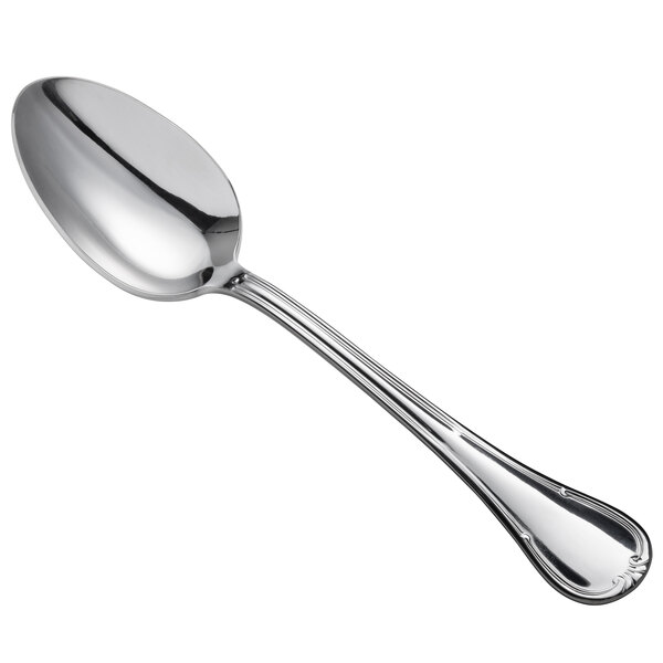 A Oneida Titian stainless steel serving spoon with a silver handle and spoon.