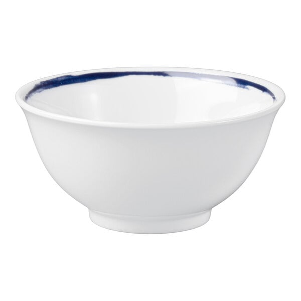 A white porcelain bowl with a dark blue accent around the inner rim.