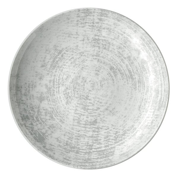 A white plate with a grey speckled pattern.