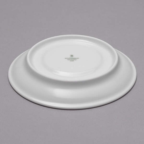 A Schonwald porcelain saucer with a grey structure.