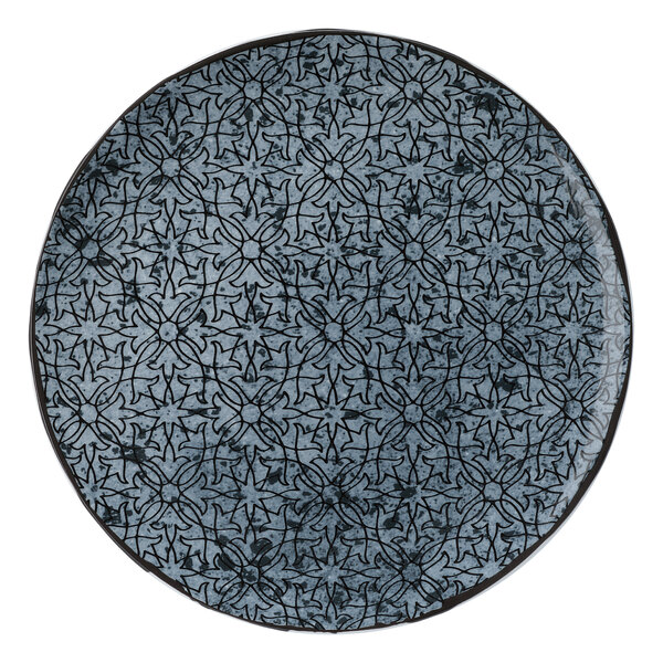 A Schonwald round porcelain coupe plate with a black and blue pattern and ornaments.