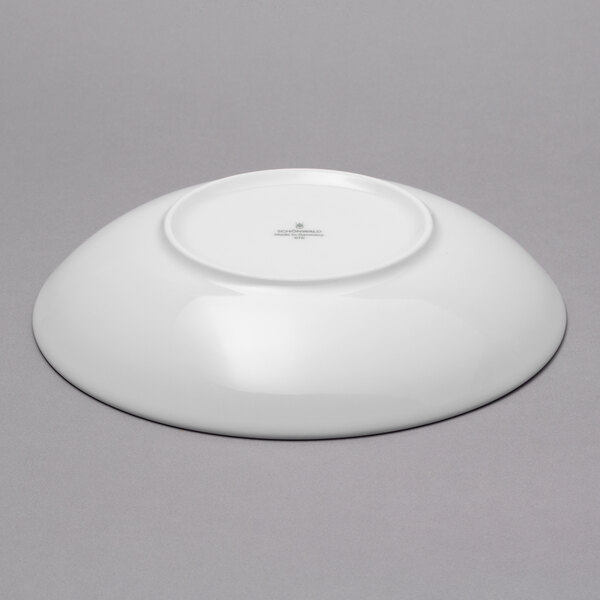A white Schonwald round porcelain deep coupe plate with a round rim.