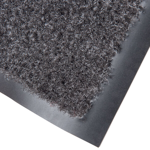 a close-up of a black carpet