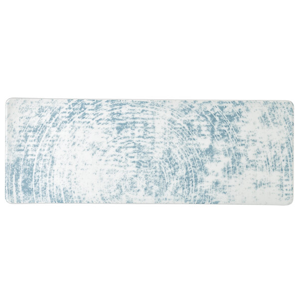 A rectangular white porcelain platter with blue cloud-like designs.