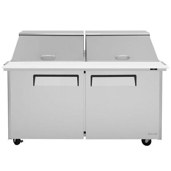 A Turbo Air stainless steel refrigerated sandwich prep table with two doors.