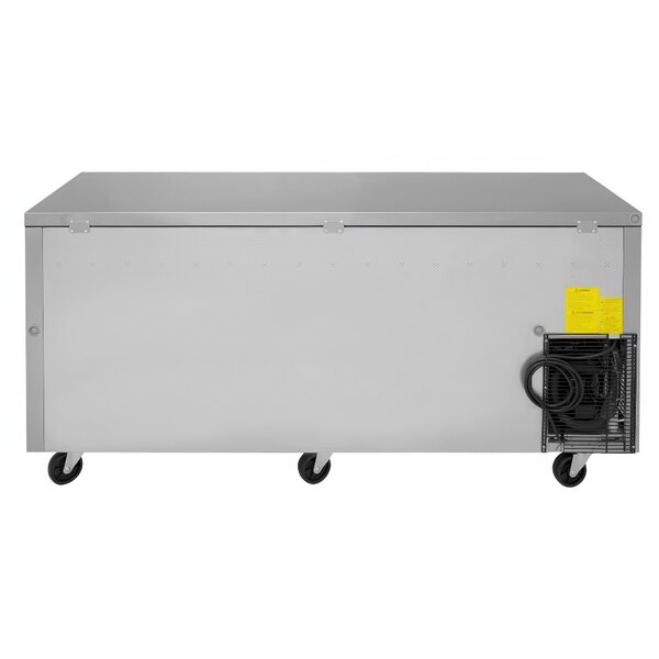 A stainless steel Turbo Air J Series undercounter refrigerator with wheels.