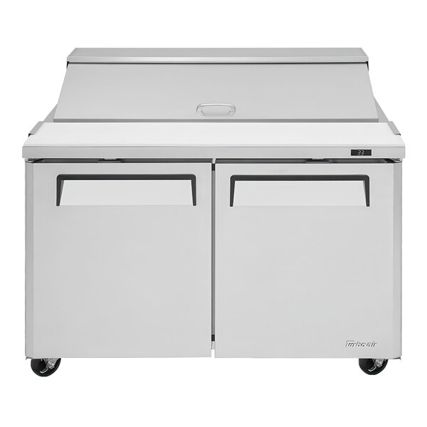 A stainless steel refrigerator with two doors.