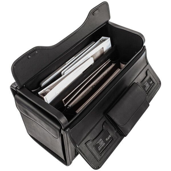 A black Stebco Koskin catalog case with papers inside.