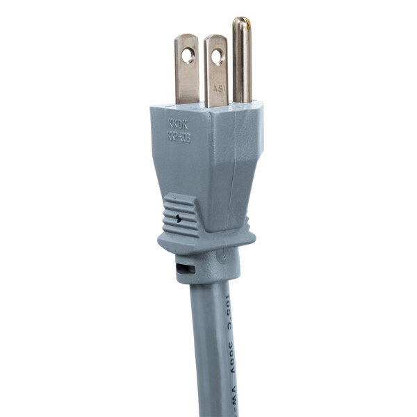 The gray plug of a Turbo Air bottom mounted reach-in refrigerator.