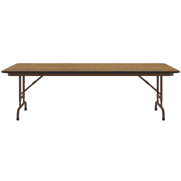 A Correll rectangular folding table with a medium oak wooden top and metal frame.