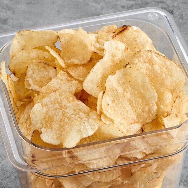 A container of Martin's Kettle Gold potato chips on a table.