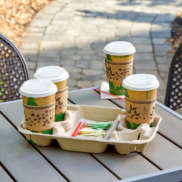 An EcoChoice molded fiber tray with three coffee cups and a white lid.