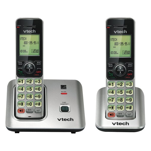 A Vtech black and silver cordless phone system with two handsets.