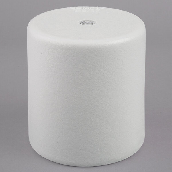 A white cylinder with a round top.