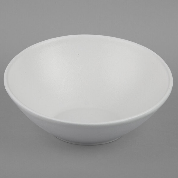 A white G.E.T. Enterprises Bugambilia sphere bowl with a textured finish.