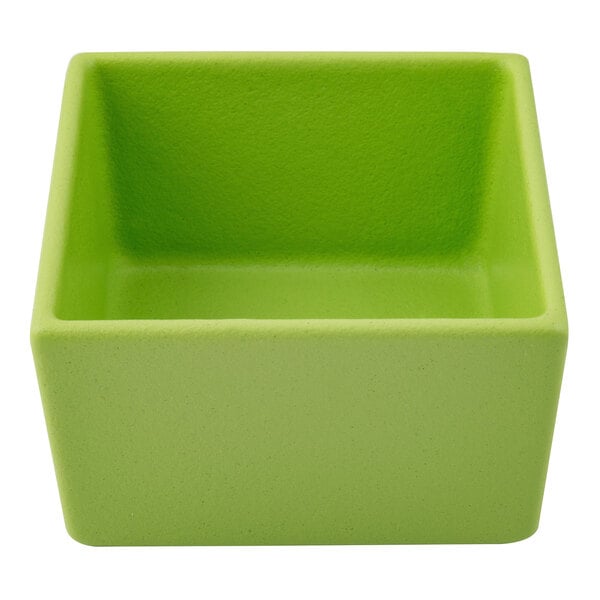 A green square G.E.T. Enterprises Bugambilia salad bowl with a textured finish.