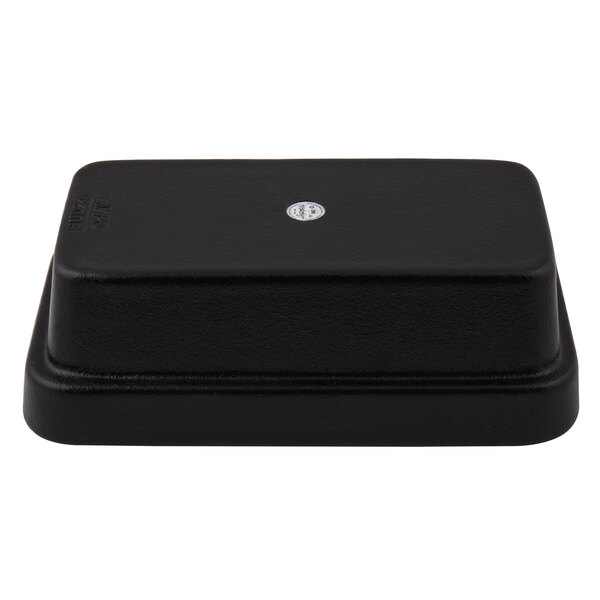 A black rectangular G.E.T. Enterprises Bugambilia bowl with a silver circle on it.