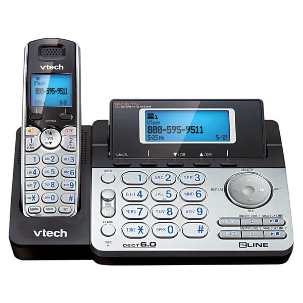 A black and silver Vtech cordless phone with a display and keypad.