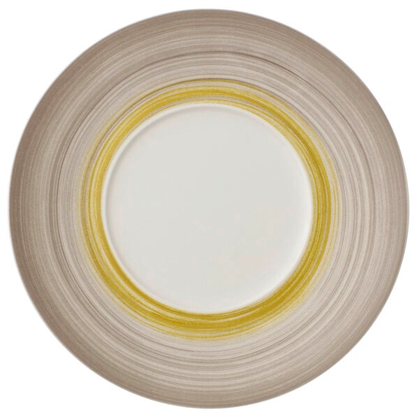 A white Villeroy & Boch premium porcelain coupe plate with a yellow striped well.