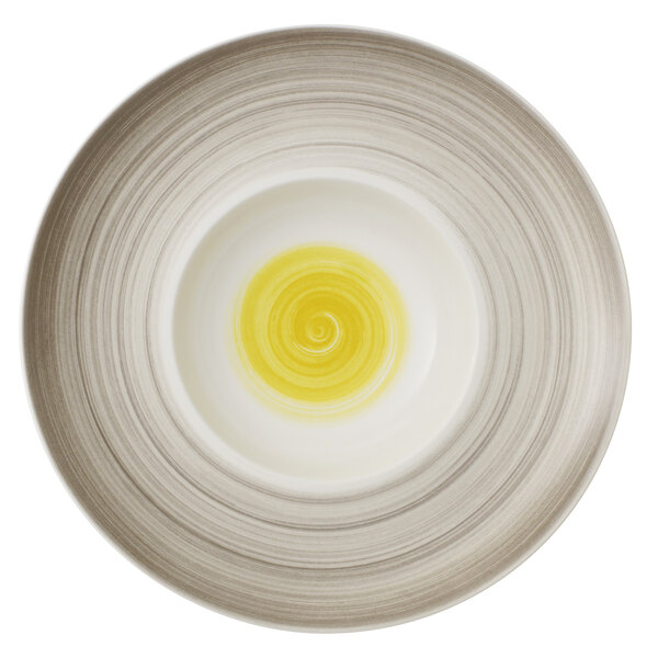 a yellow swirl in a white bowl