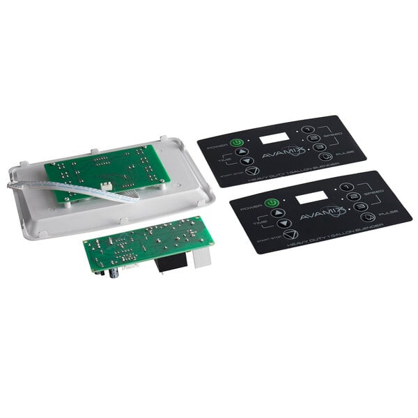 A green circuit board with white and black electronic components and two white wires.