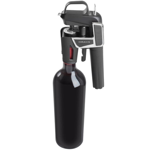 A Coravin wine bottle opener with a black handle.