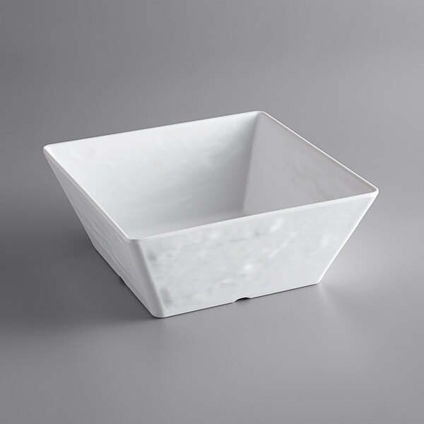 a white square bowl on a gray background