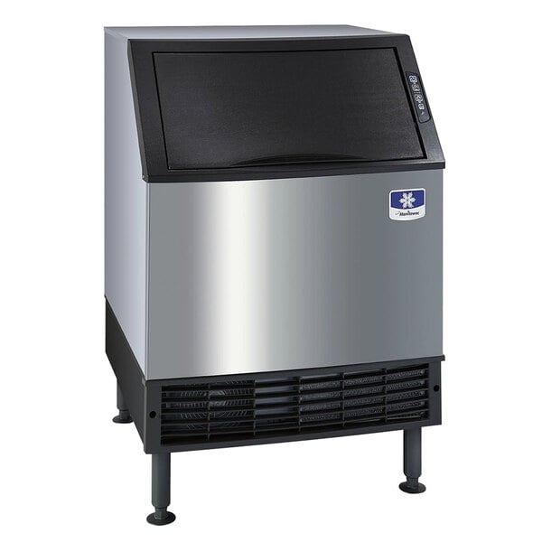 A Manitowoc undercounter ice machine with a black door.