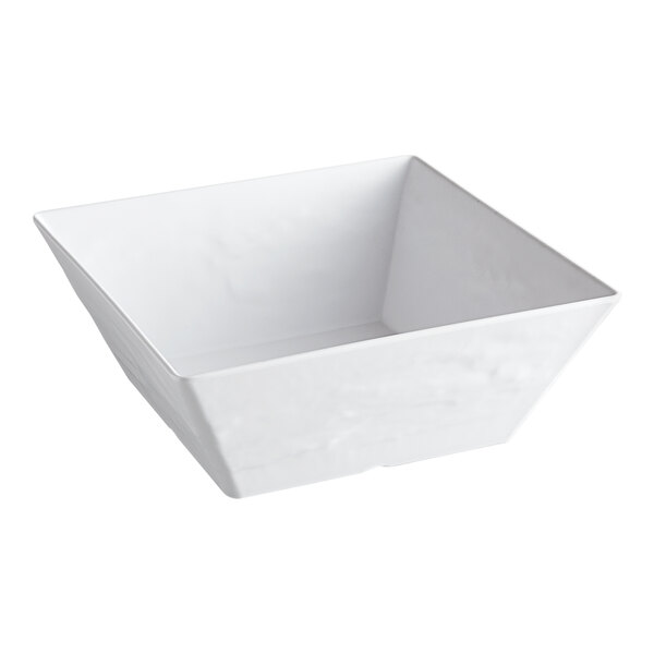 A white, square-shaped bowl with smooth sides and a modern design.