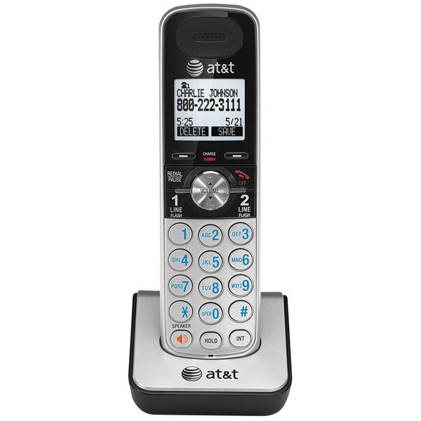 An AT&T cordless phone handset with a silver and black display.