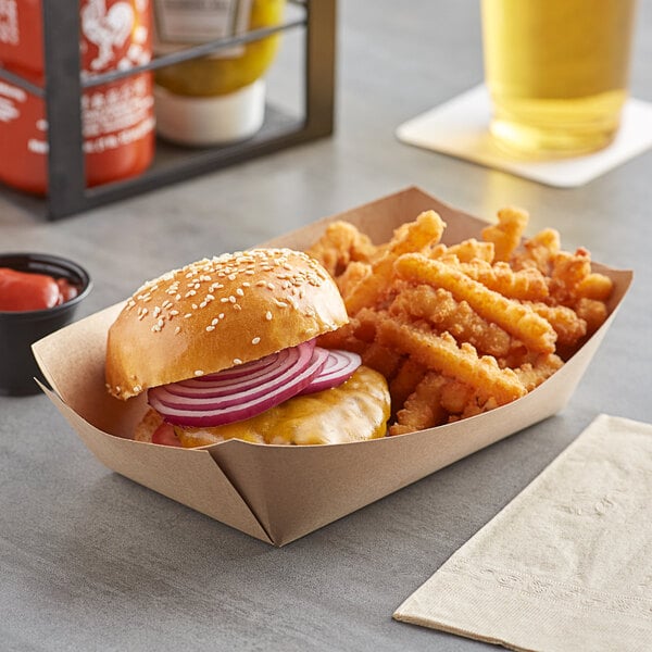 A burger and fries in a Bagcraft Packaging EcoCraft paper tray.