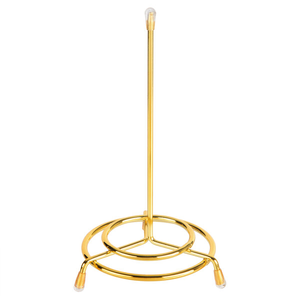 A Vollrath brass check spindle with a round base.