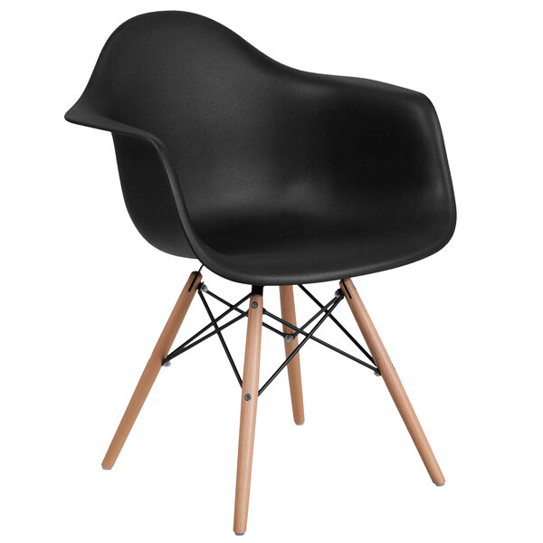 a black chair with wooden legs