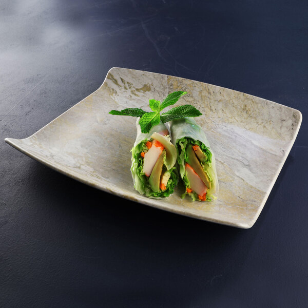 A sandstone rectangular melamine tray with food on it.