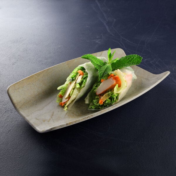 A rectangular sandstone melamine tray with food on it.