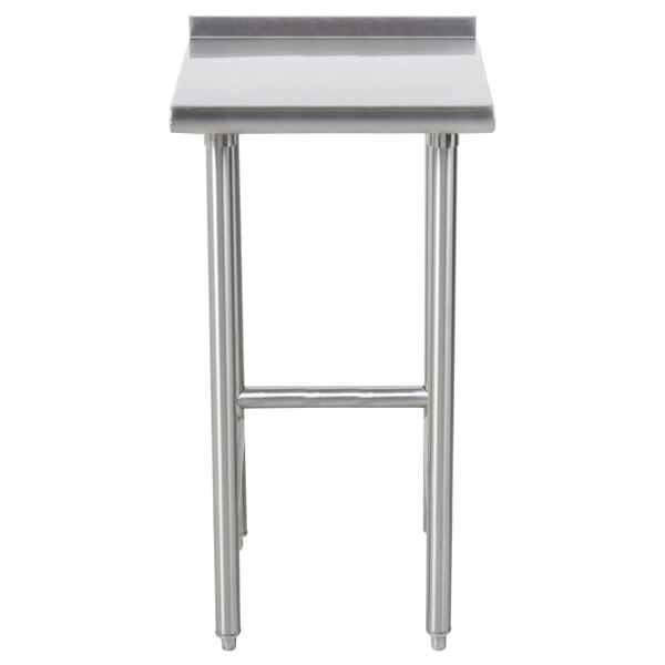 An Advance Tabco stainless steel equipment filler table with a metal top.